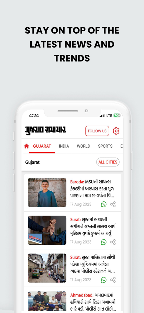 Smartphone displaying news in Gujarati language on the Gujarat Samachar app