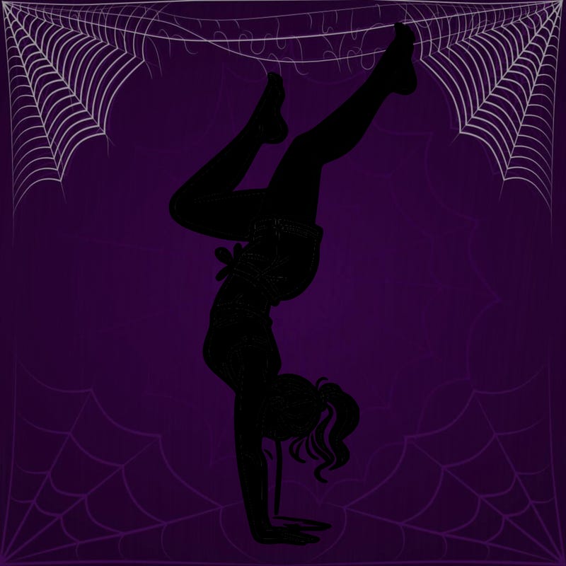 woman doing a hand stand