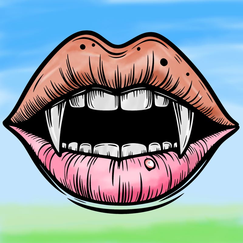 lips with vampire teeth