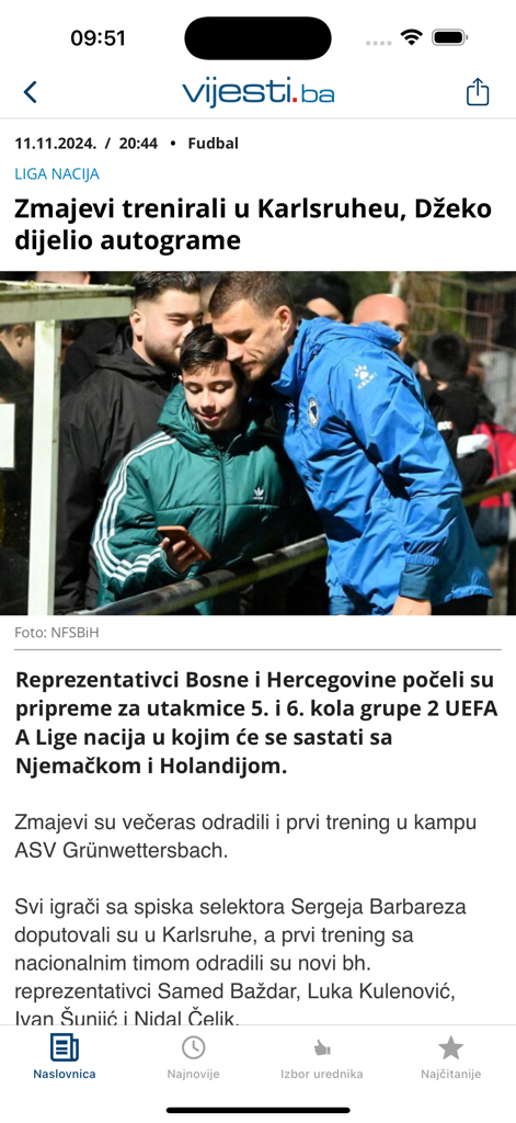 Screenshot of the Vijesti Ba app displaying a football news article featuring Edin Dzeko and the Bosnian national team