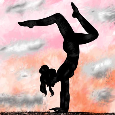 a woman doing a handstand
