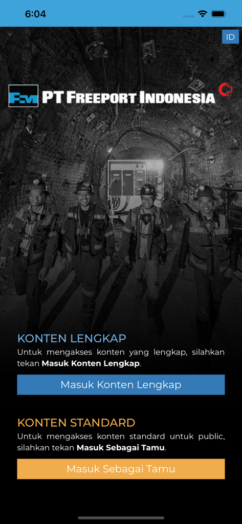 Willkommensbildschirm der Freeporters App, der Bergleute von PT Freeport Indonesia in einem unterirdischen Tunnel zeigt