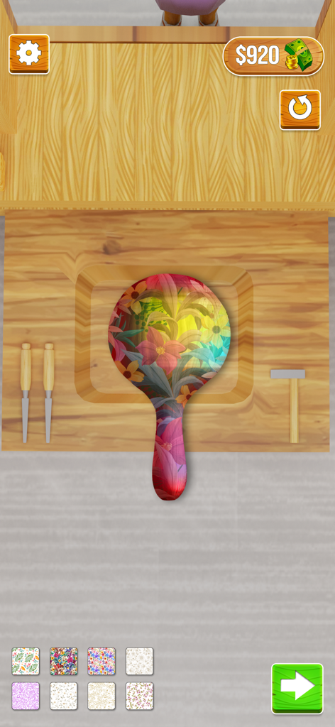 Wood Carving 3D - A carved wooden object decorated with a colorful floral pattern in a workshop simulation game.