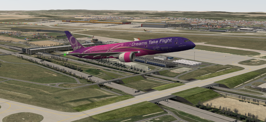 A Boeing 787 with a purple Dreams Take Flight livery taking off from a realistic 3D airport in World of Airports.