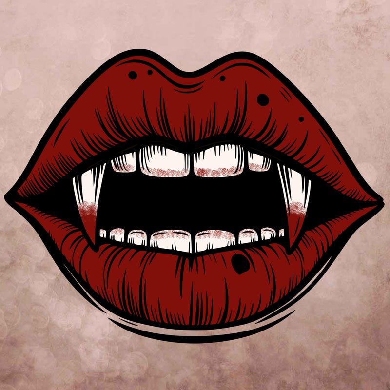 lips with vampire teeth