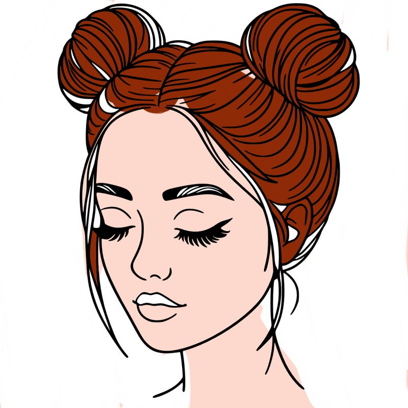 woman with hair buns