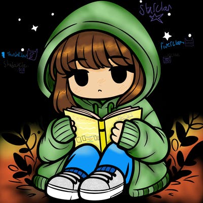girl in oversized hoodie reading a book