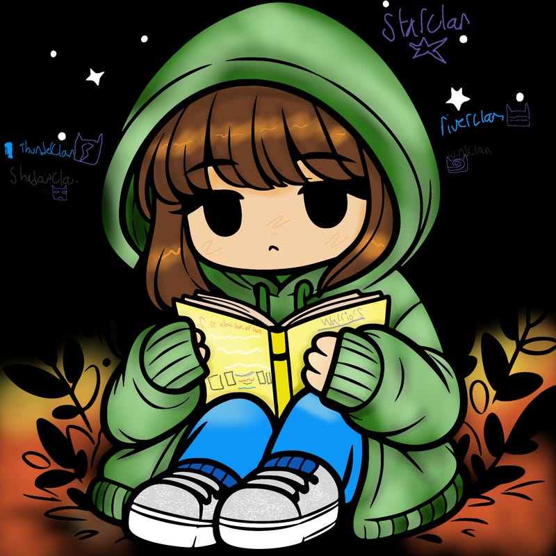 girl in oversized hoodie reading a book