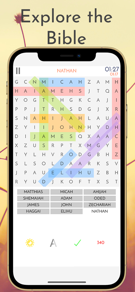 A mobile phone showing a bible word search game with names like Micah and John highlighted in a puzzle grid