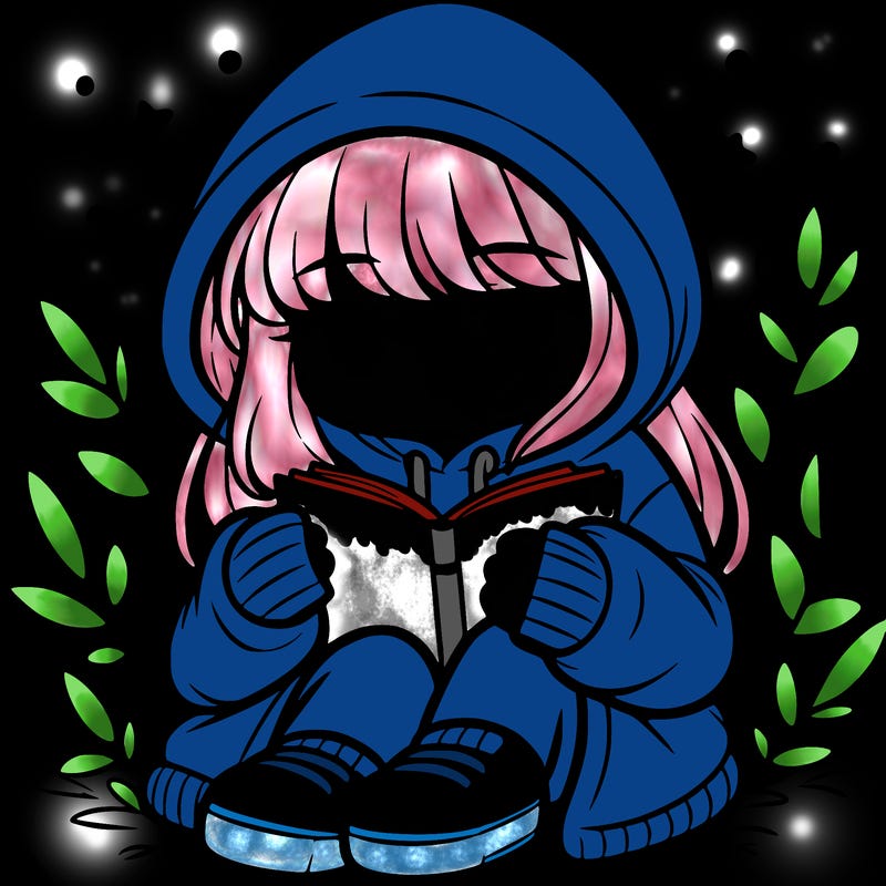 girl in oversized hoodie reading a book