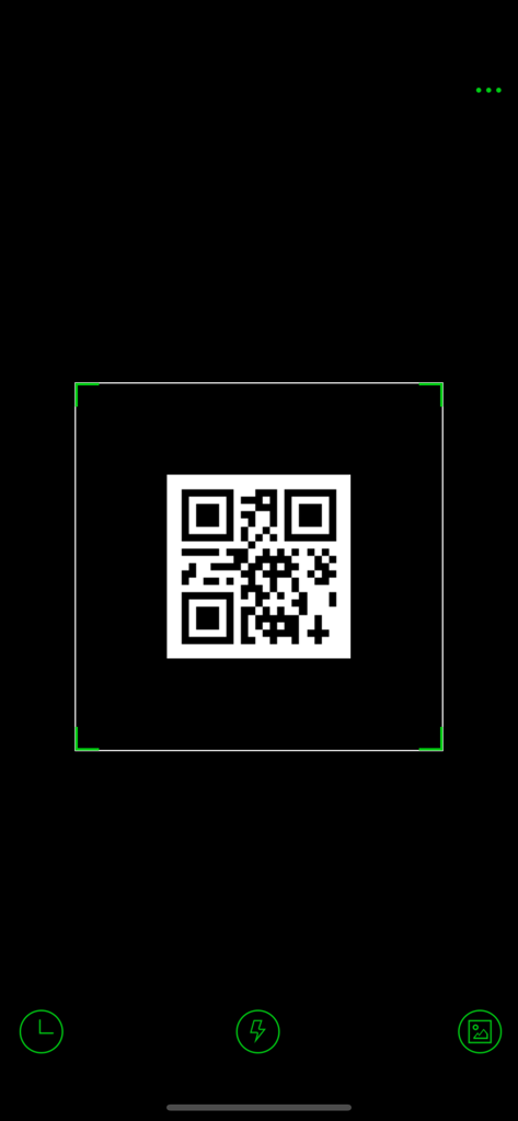 QR code scanner app interface showing a QR code within a scanning frame and utility buttons