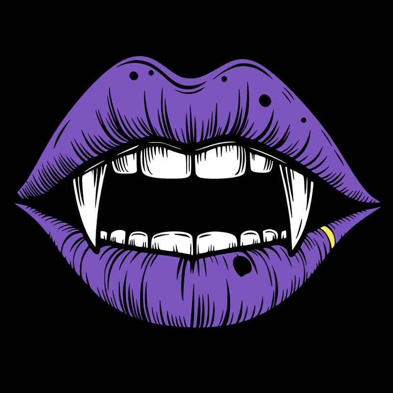 lips with vampire teeth