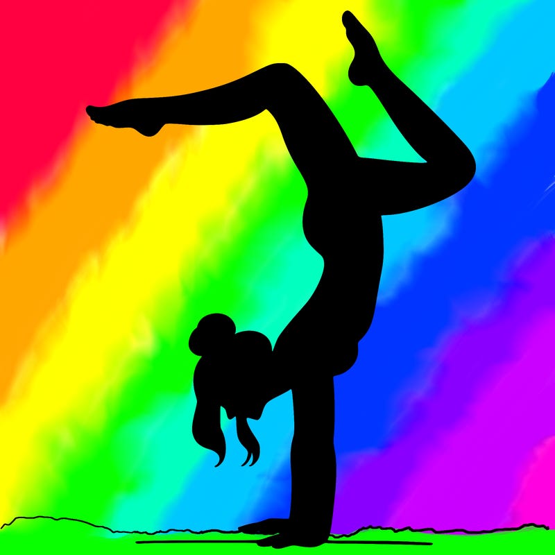 a woman doing a handstand