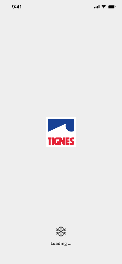 Tignes - Tignes mobile app splash screen featuring the resort logo and a snowflake loading icon