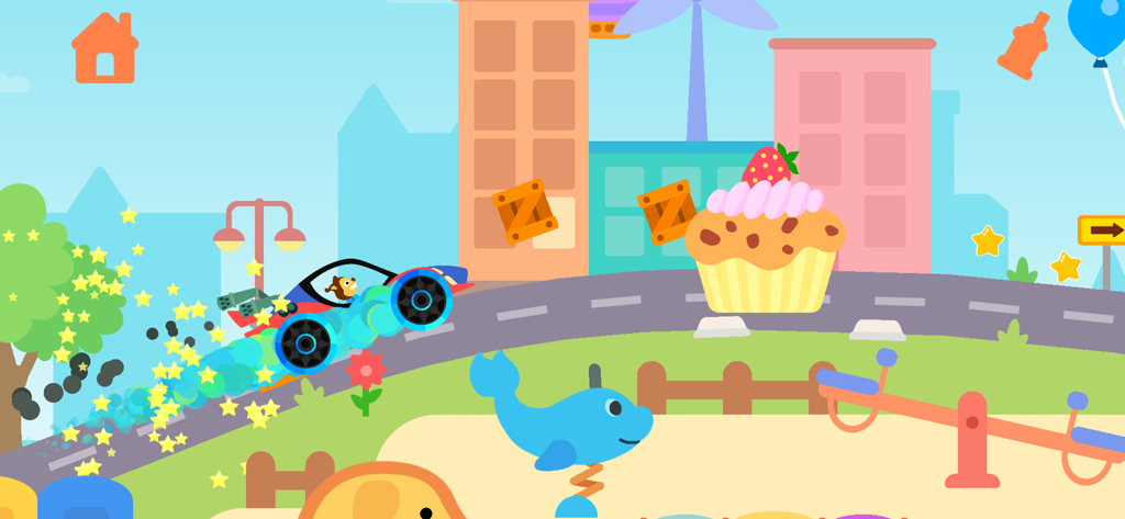 Ein blauer Rennwagen fährt durch einen bunten Cartoon-Spielplatz mit einem riesigen Cupcake