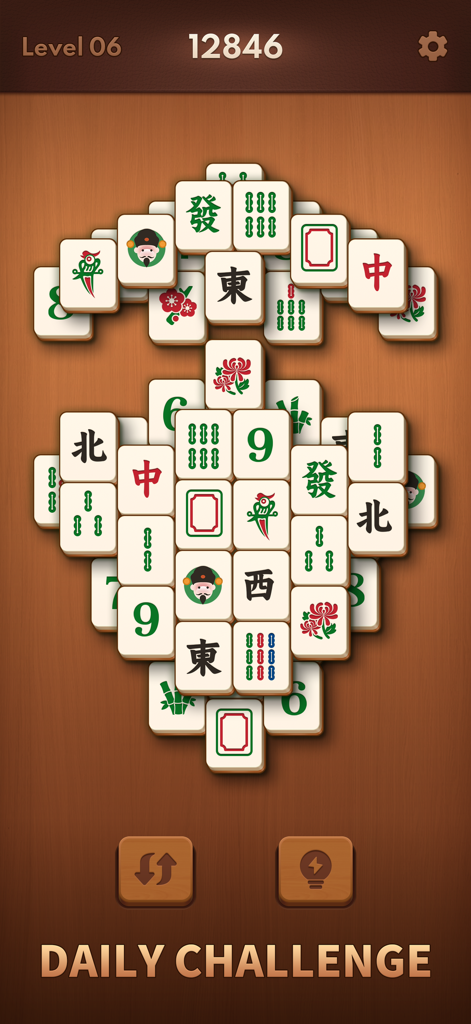 Mahjong Blast gameplay screen showing large tiles in a solitaire layout for a daily challenge