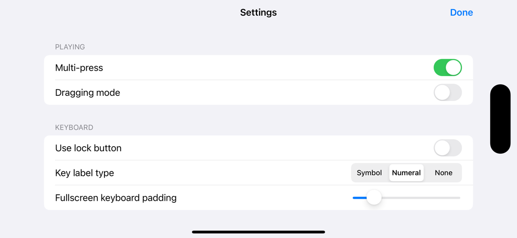 Settings screen of the Isomorphic Keyboard app showing configuration options for multi-press, key labels, and keyboard padding.