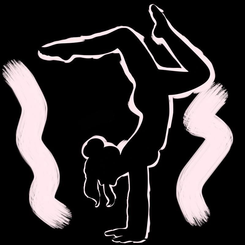 a woman doing a handstand